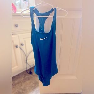 Nike one piece girls swimsuit. Size is Youth Medium